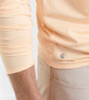 Stealth Performance Quarter-Zip in Light Orange Sherbert by Peter Millar