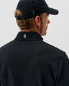 Hoppin Ribbed Knit Performance 1/4 Zip Pullover in Black by Johnnie-O